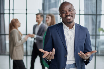 Handsome african american executive businessman in modern office