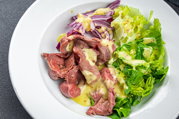 chicken stomach salad green lettuce, onion chicken meat offal vegetable meal food snack on the table copy space food background rustic top view