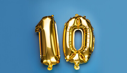Banner with number 10 golden balloon with copy space. Ten years anniversary celebration concept on a blue background. © Uuganbayar