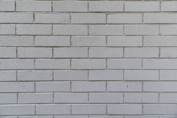 White brick wall bonded with cement. Vector white brick texture background