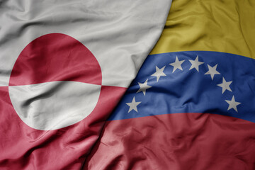 big waving realistic national colorful flag of greenland and national flag of venezuela . © luzitanija