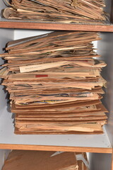 Stack of cardboards and papers.