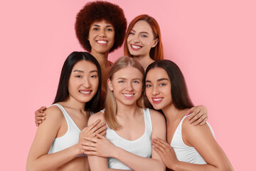 Fototapeta premium Portrait of beautiful young women on pink background
