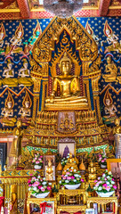 Fototapeta na wymiar Colorful Buddha Main Hall Wat That Temple Sanarun Bangkok Thailand