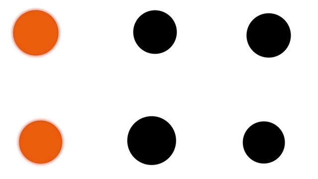 Large black circles are lit in turn with red light or color.