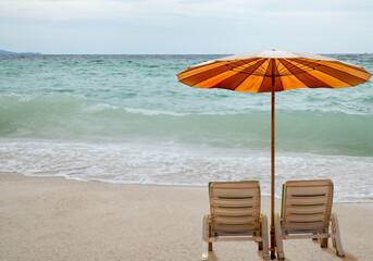 beach umbrella and chairs