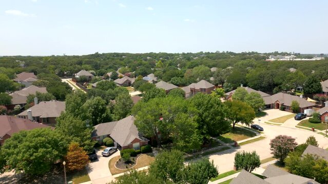 Aerial video upscale residential neighborhood Denton Texas USA