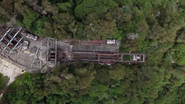 Overhead drone flight over the ruins of the old cable car station El Liron, located in San Antonio de Galipan, Venezuela