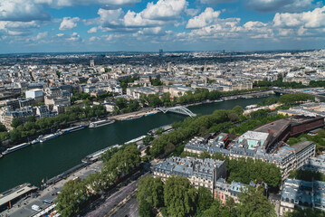 Fototapeta na wymiar Panoramic Paris from Eiffel Tower and view of the Seine River. Paris, France. 