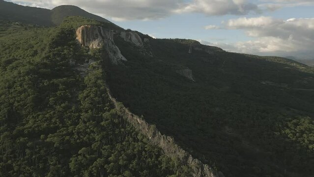 Flyby: Unique calcite flowstone cliff wall of Hierve el Agua in Mexico