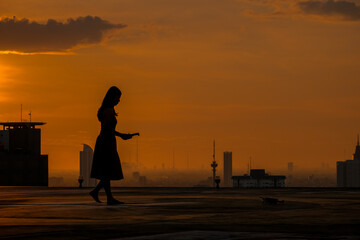 silhouette of a person at the skyscraper 