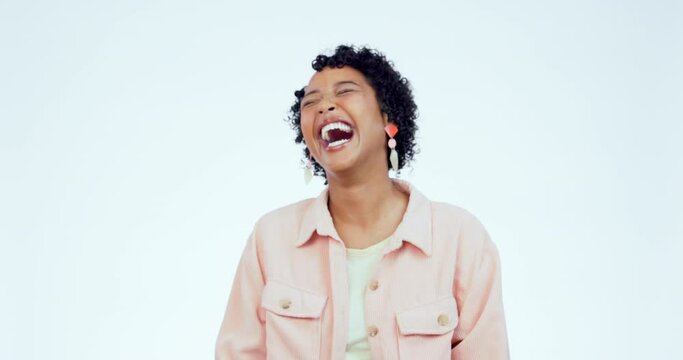 Face, funny and woman with a smile, fashion and model on a white studio background. Portrait, person and girl with humor, joke and comedy with happiness, winner and laughing with excited and energy