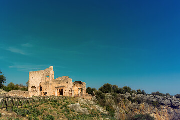 Canytellis, Kanytella under the beatiful sky. Picturesque sunny landscape view ruins of antique stone buildings. Turkey, Mersin.