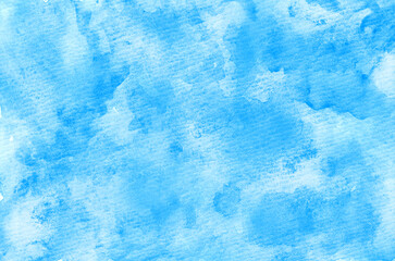 Fototapeta na wymiar 水彩をにじませたザラザラとした質感の紙背景　青色