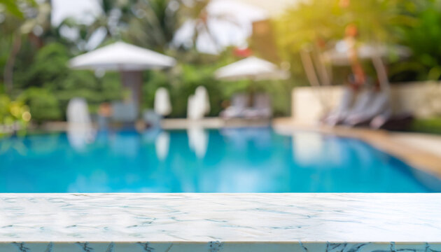 Empty white marble stone table top and blurred swimming pool in tropical resort in summer banner background - can used for display or montage your products.