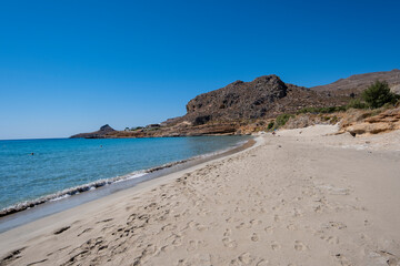 Fototapeta na wymiar Crete, Xerocampos beautiful sandy beach Mazida i Ammos with shallow water for a long stretch. Lasithi Province, Greece 
