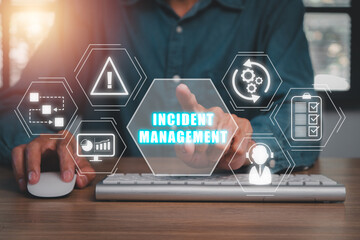 Incident Management process Business Technology concept, Business person hand touching incident management icon on virtual screen.