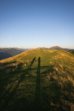 The shadows of two hikers in the Pyrenees