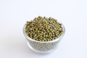 The mung bean in glass bowl isolated on white background.