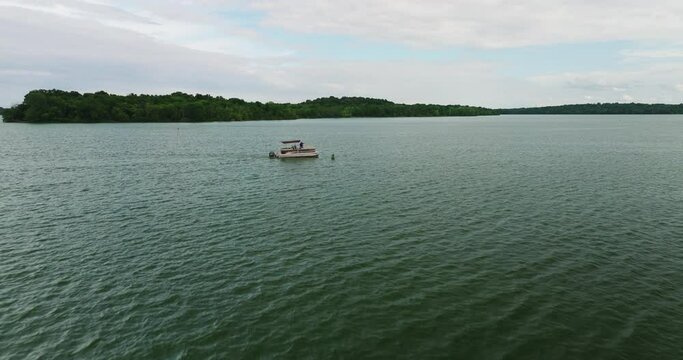 Pontoon Boat Sailing In The Percy Priest Lake Near The Long Hunter State Park, Hermitage, Tennessee, USA. - aerial