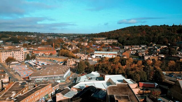Aerial drone footage of the English market town centre of Dewsbury in West Yorkshire in the UK showing the historical town centre and the Dewsbury townhall.