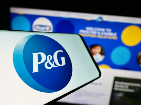 Stuttgart, Germany - 08-06-2023: Mobile phone with logo of American business The Procter Gamble Company on screen in front of website. Focus on center-left of phone display.