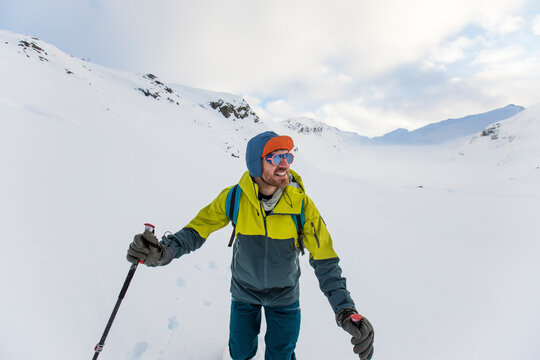 Wide angle portrait of a backcountry skier