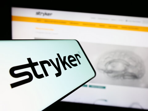 Stuttgart, Germany - 08-09-2023: Smartphone with logo of US medical technology company Stryker Corporation on screen in front of website. Focus on center-right of phone display.