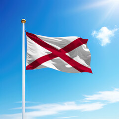 Waving flag of Alabama is a state of United States on flagpole