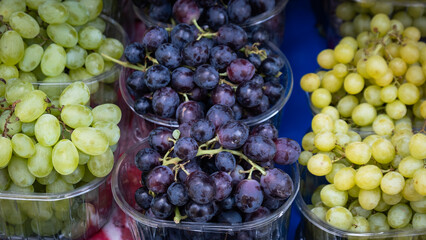 red and white grapes in the greengrocer shop