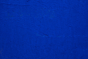 Dark blue concrete wall surface. Old cement background. Copy space for design.	