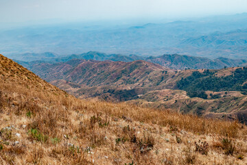 Fototapeta na wymiar Mountain landscapes against sky seen from Mbeya Peak in Tanzania