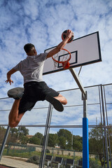 Faceless basketball player jumping on sports ground © ADDICTIVE STOCK CORE
