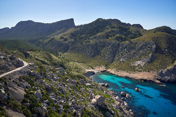 Picturesque view of green rocky mountains and sea