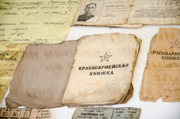 Old books and postcards from the 20th century on the table