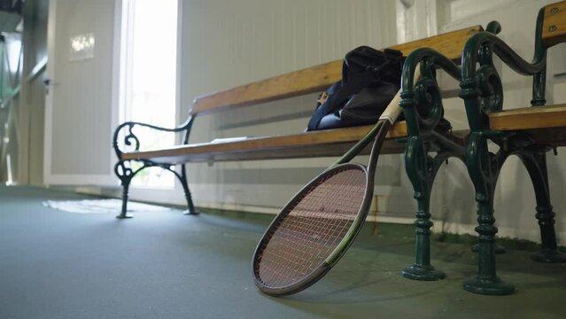 Tennis Racket On The Bench