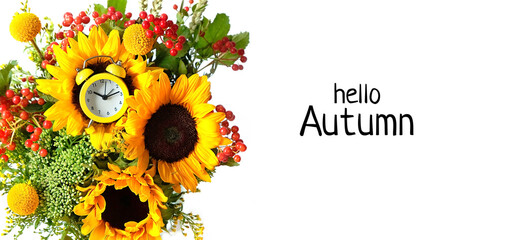 Hello Autumn. bright bouquet with sunflowers and alarm clock on white background. symbol of autumn season, fall time. autumn equinox holiday. element for design