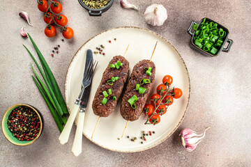 kofta or lula kebabs skewers. Restaurant menu, dieting, cookbook recipe top view