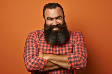 Fototapeta premium portrait of a man an orange studio background