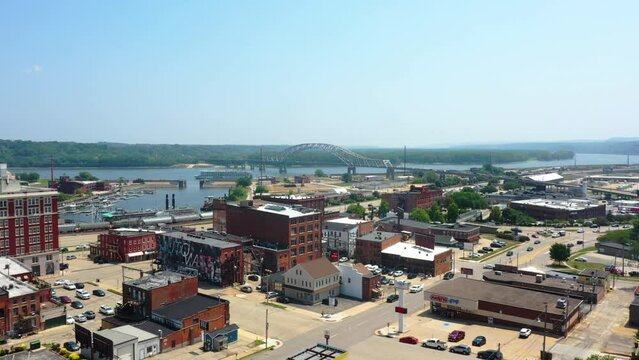 Aerial view of the Dubuque town and the Mississippi river, in sunny Iowa, USA - Ascending, drone shot