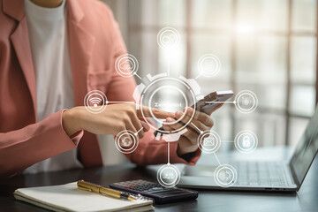 Zero trust security concept Person using smartphone and tablet with zero trust icon on virtual screen of Data businesses.in office.