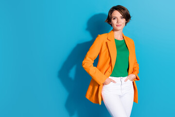 Photo of attractive charming nice young entrepreneur bob brown hair woman put her hands pockets...