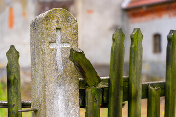 Close-up of the church's forgotten, dilapidated wooden fence.