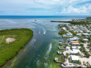 Aerial view of  homes and large boat channel cut through Tavernier key island in the Florida Keys