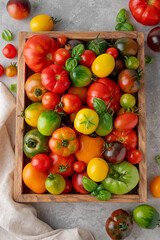 A mix of ripe multi-colored organic tomatoes. Healthy food.
