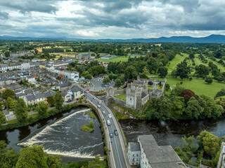 Aerial view of Cahir castle and town in Ireland with Tower House, outer castle, circular,...