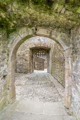 Fototapeta na wymiar Double medieval gate with portcullis at Cahir castle Ireland