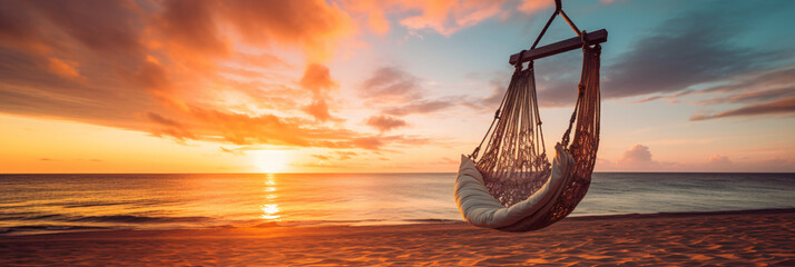 Swing chair or hammock on beautiful empty beach on summer