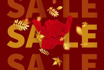 Autumn clothing concept, discount and sale. Red flying knitted sweater, golden fall leaves, yellow letters SALE on burgundy background. Cut out warm woolen knitted sweater, pullover, jacket. Mockup