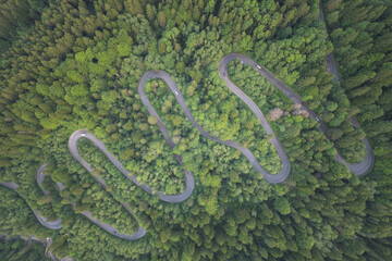 Aerial view above Transbucegi mountain road, in Romania